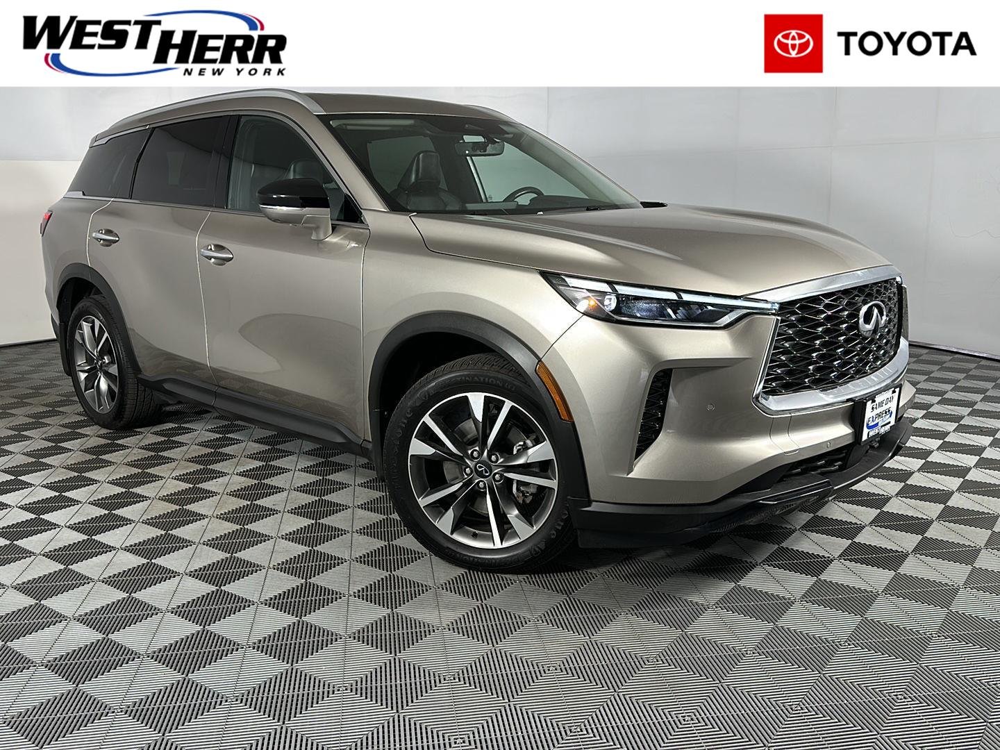 Used 2023 Warm Titanium INFINITI LUXE image 1