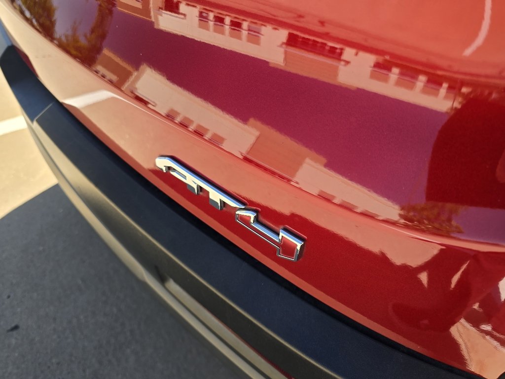 Used 2023 Volcanic Red Tintcoat GMC AT4 image 10