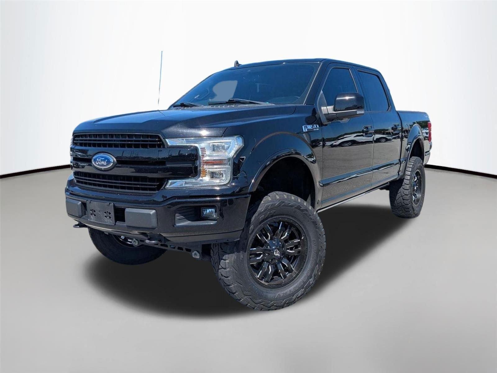 Used 2020 Agate Black Metallic Ford LARIAT image 1