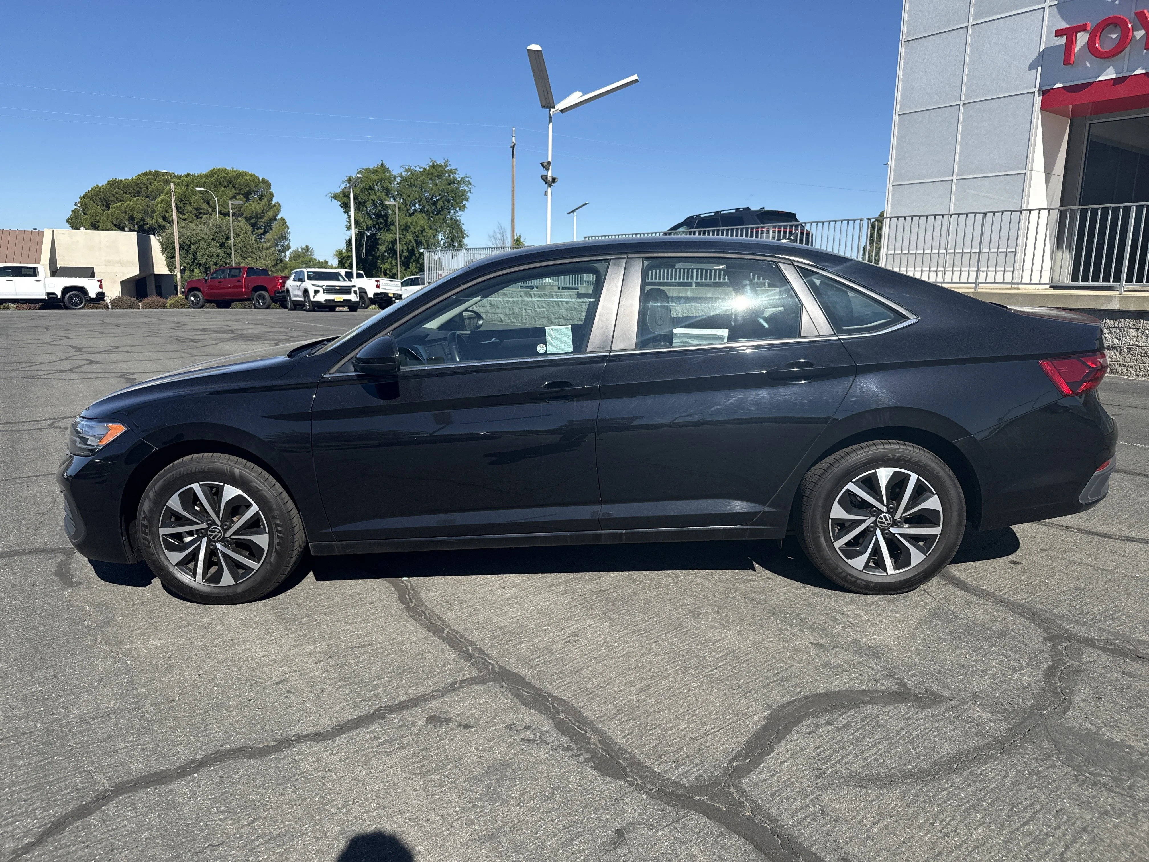 Used 2024 Black Volkswagen S image 2