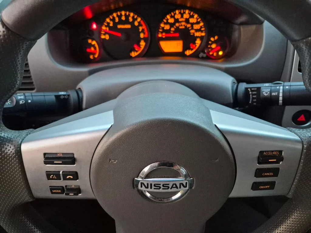 Used 2016 Magnetic Black Nissan SV image 23