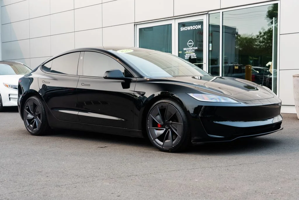Used 2024 Black Tesla Performance image 1