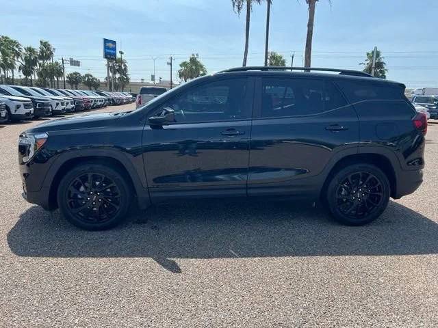 Used 2024 Ebony Twilight Metallic GMC SLE image 4