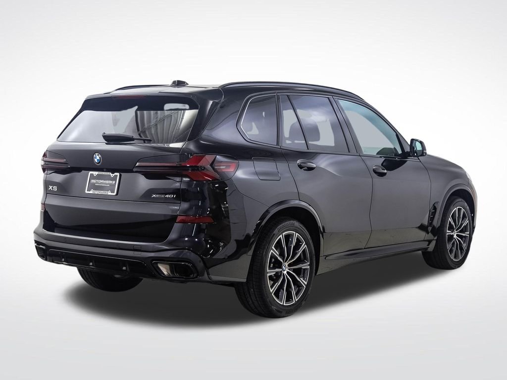 Certified Used 2024 Black Sapphire Metallic BMW xDrive40i image 5