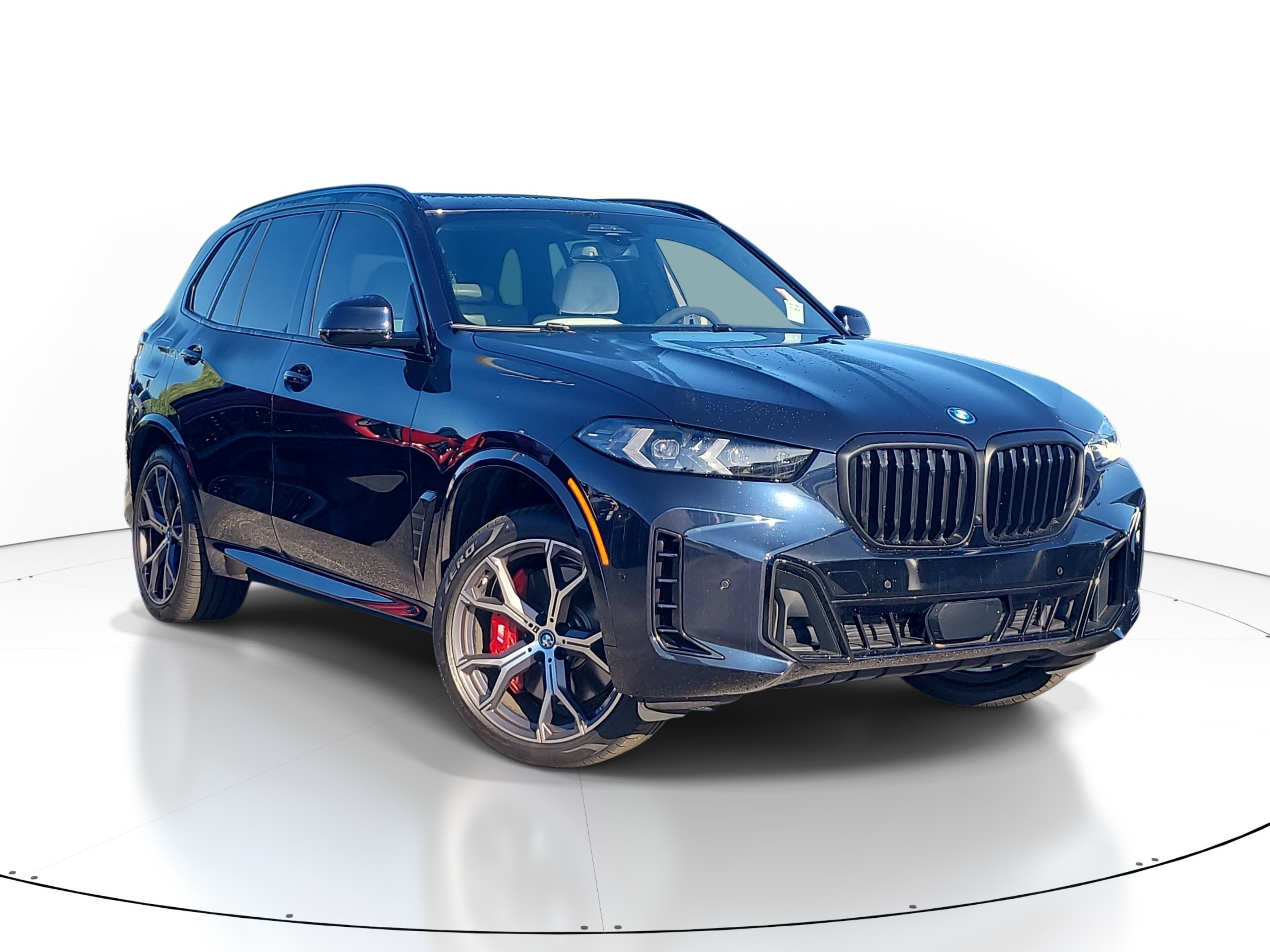 Used 2025 Carbon Black Metallic BMW xDrive50e image 1