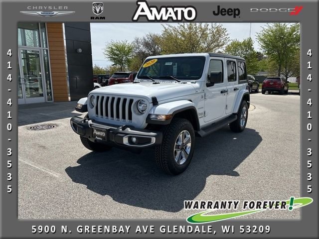 Used 2020 White Jeep Unlimited Sahara image 1