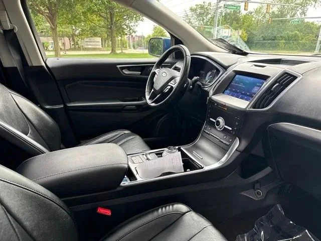 Used 2020 Blue Metallic Ford Titanium image 18