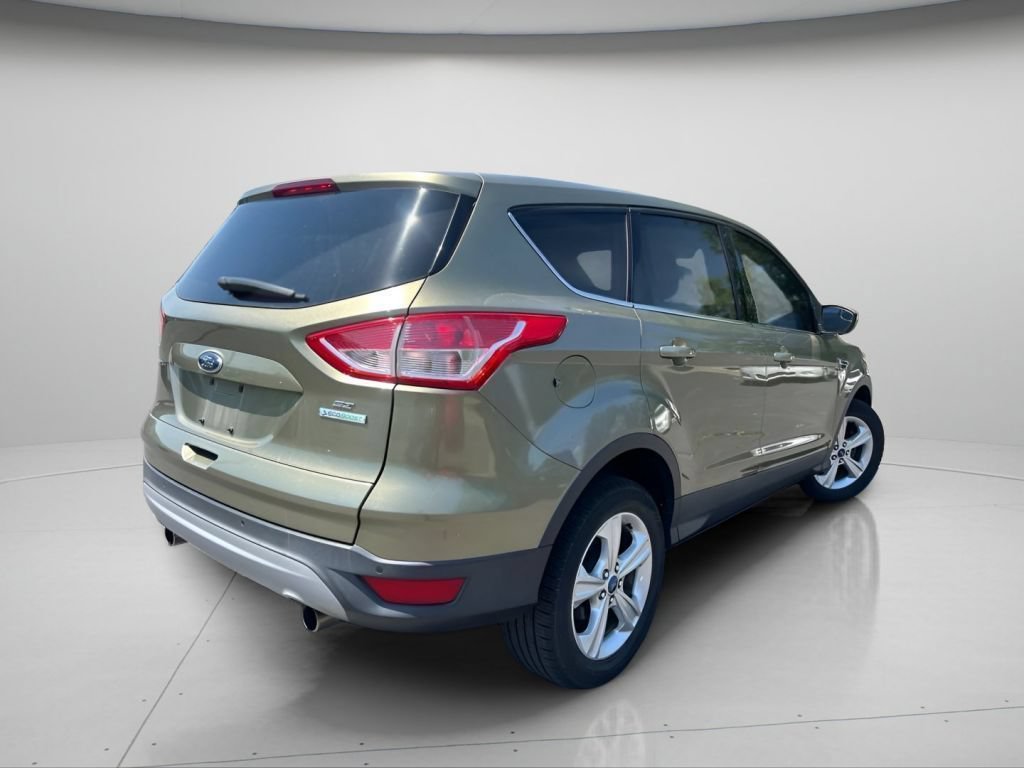 Used 2013 Ginger Ale Metallic Ford SE image 5