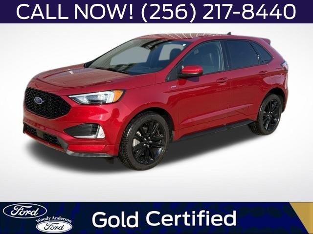 Used 2024 Rapid Red Metallic Tinted Clearcoat Ford ST Line image 1