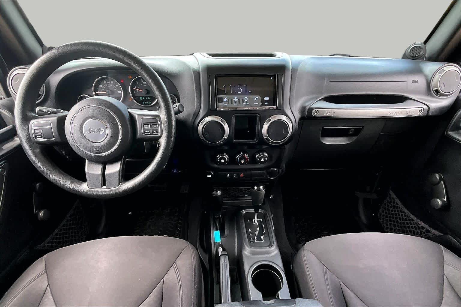 Used 2014 Black Clearcoat Jeep Sport image 15
