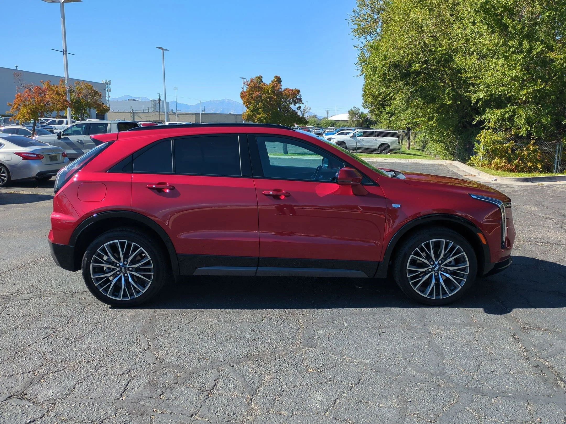 Used 2024 Radiant Red Tintcoat Cadillac AWD Sport image 6