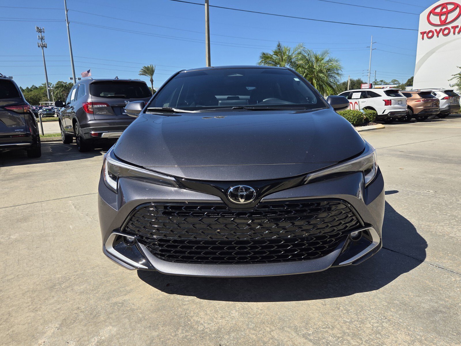 Used 2025 Magnetic Gray Metallic Toyota XSE image 1