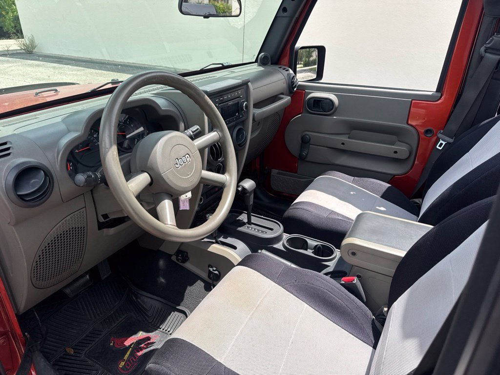 Used 2009 Sunburst Orange Pearl Jeep X image 2