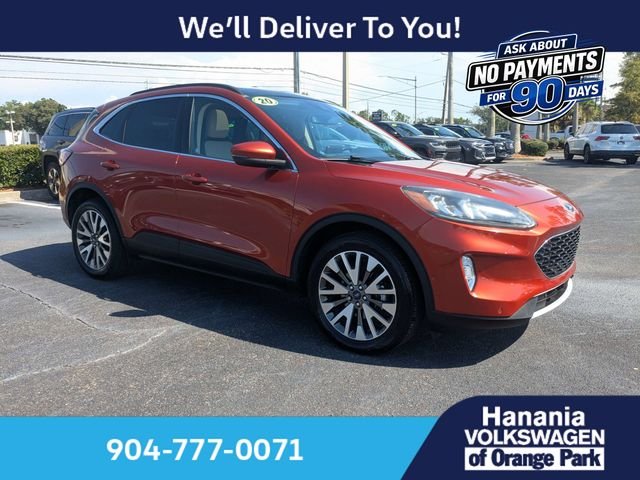 Used 2020 Orange Ford Titanium image 1