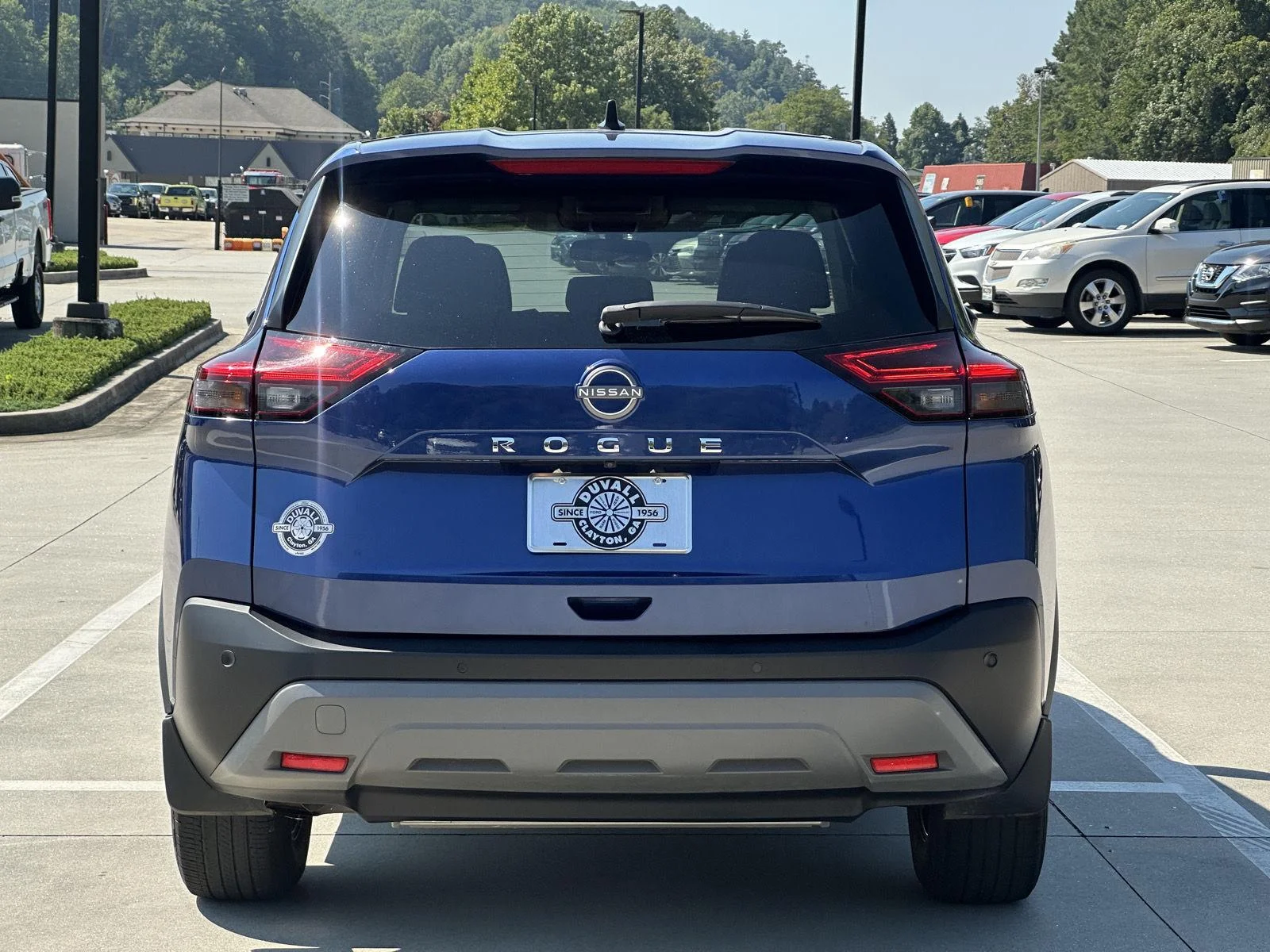 Used 2023 Caspian Blue Metallic Nissan S image 6