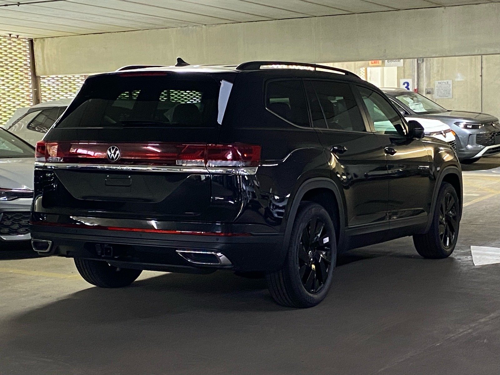 New 2026 Black Volkswagen SE w/Technology image 3