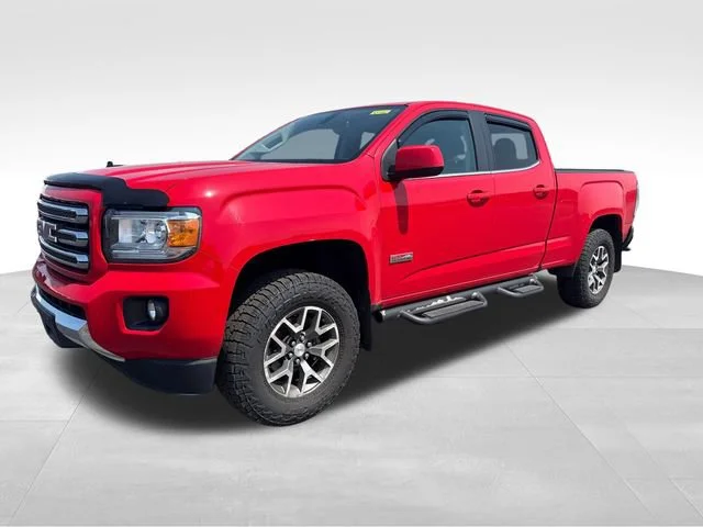 Used 2015 Cardinal Red GMC 4WD SLE image 1