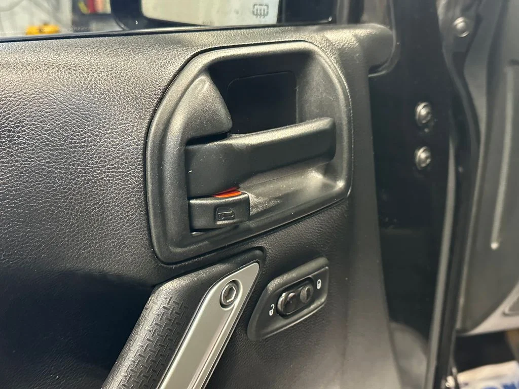 Used 2016 Black Jeep Unlimited Sahara image 13