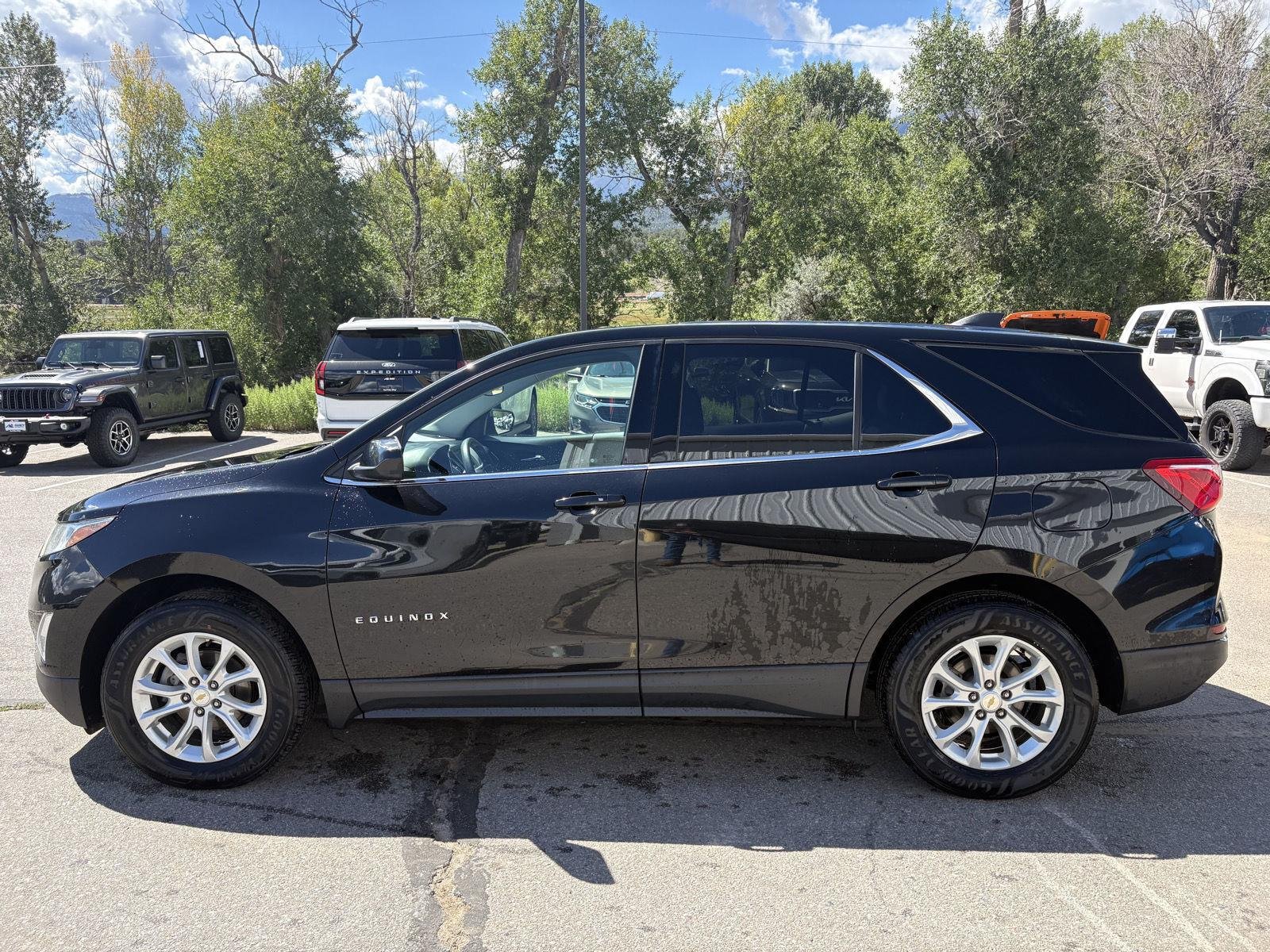 Used 2020 Chevrolet Equinox LT with VIN 2GNAXUEV1L6109825 for sale in Salida, CO