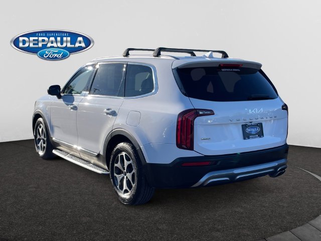 Used 2022 White Pearl Kia EX image 4