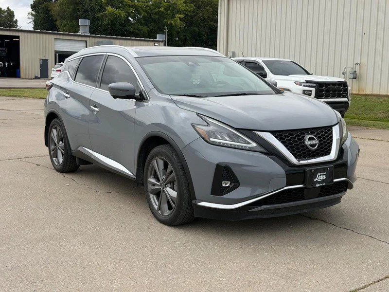 Used 2023 Gray Nissan Platinum image 1