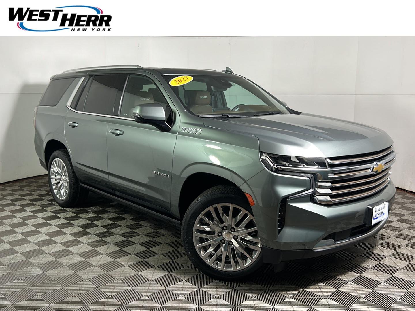 Used 2023 Silver Sage Metallic Chevrolet High Country image 1