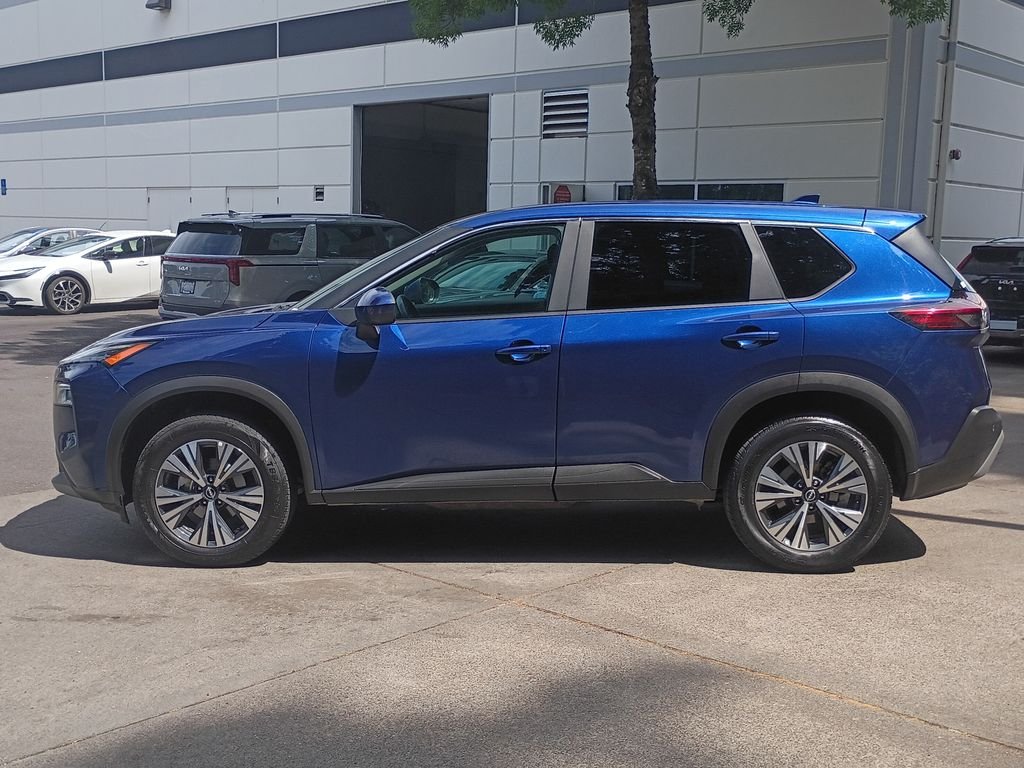 Used 2023 Caspian Blue Metallic Nissan SV image 6