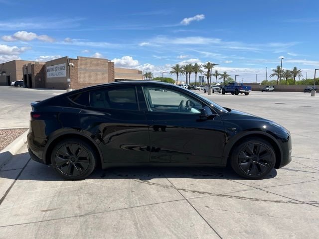 Used 2025 Tesla Model Y Long Range with VIN 7SAYGAEE4SF312659 for sale in Phoenix, AZ