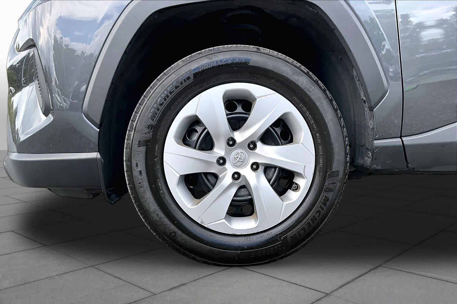 Used 2024 Magnetic Gray Metallic Toyota LE image 11
