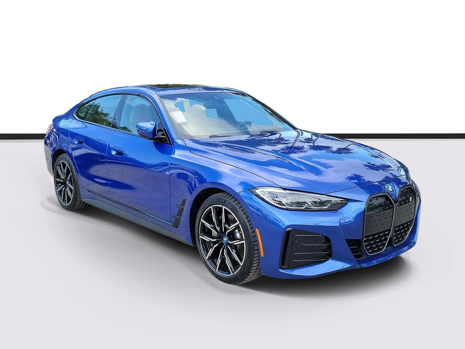 Certified Used 2024 Portimao Blue Metallic BMW eDrive40 image 1