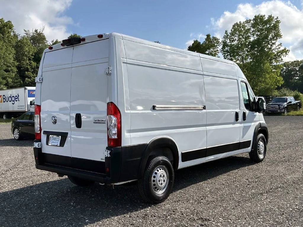 Used 2025 Bright White Clearcoat Ram High Roof image 7
