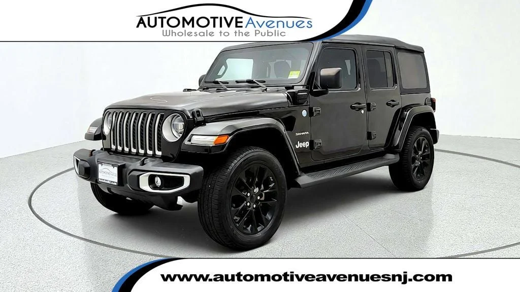 Used 2021 Black Clearcoat Jeep Unlimited Sahara 4xe w/ Cold Weather Group & Keyless Entry image 1