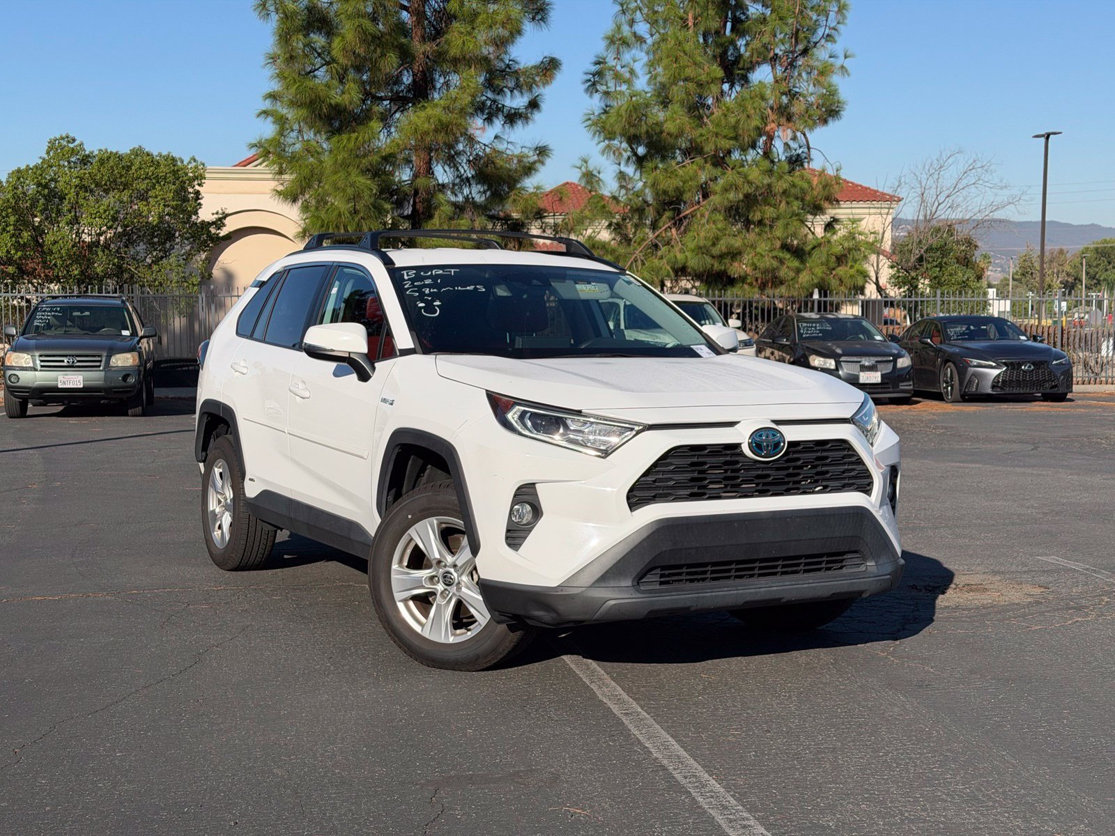 Certified Used 2021 Super White Toyota XLE image 1