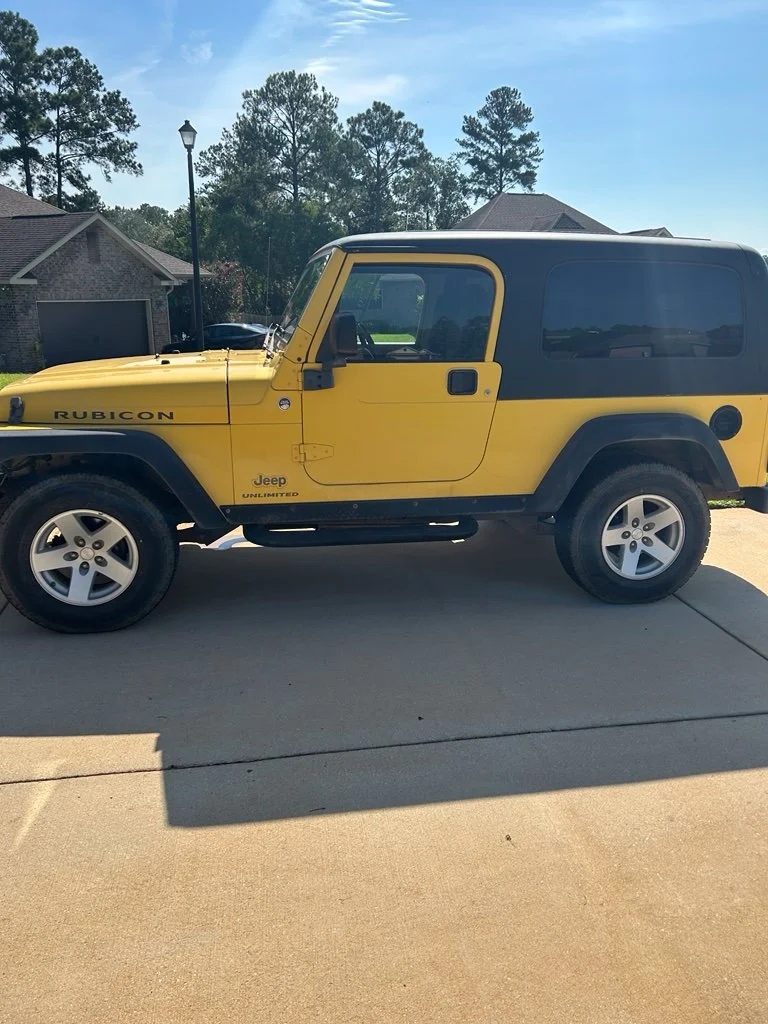 Used 2006 Yellow Jeep Unlimited Rubicon image 2