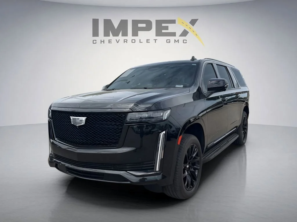 Used 2022 Black Raven Cadillac Sport image 1