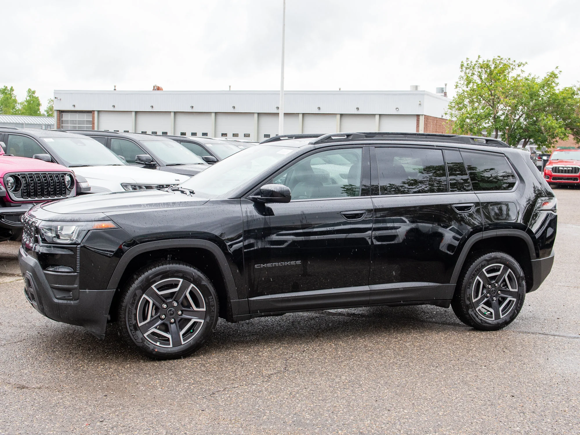 New 2026 Black Jeep Laredo * Hybrid image 2