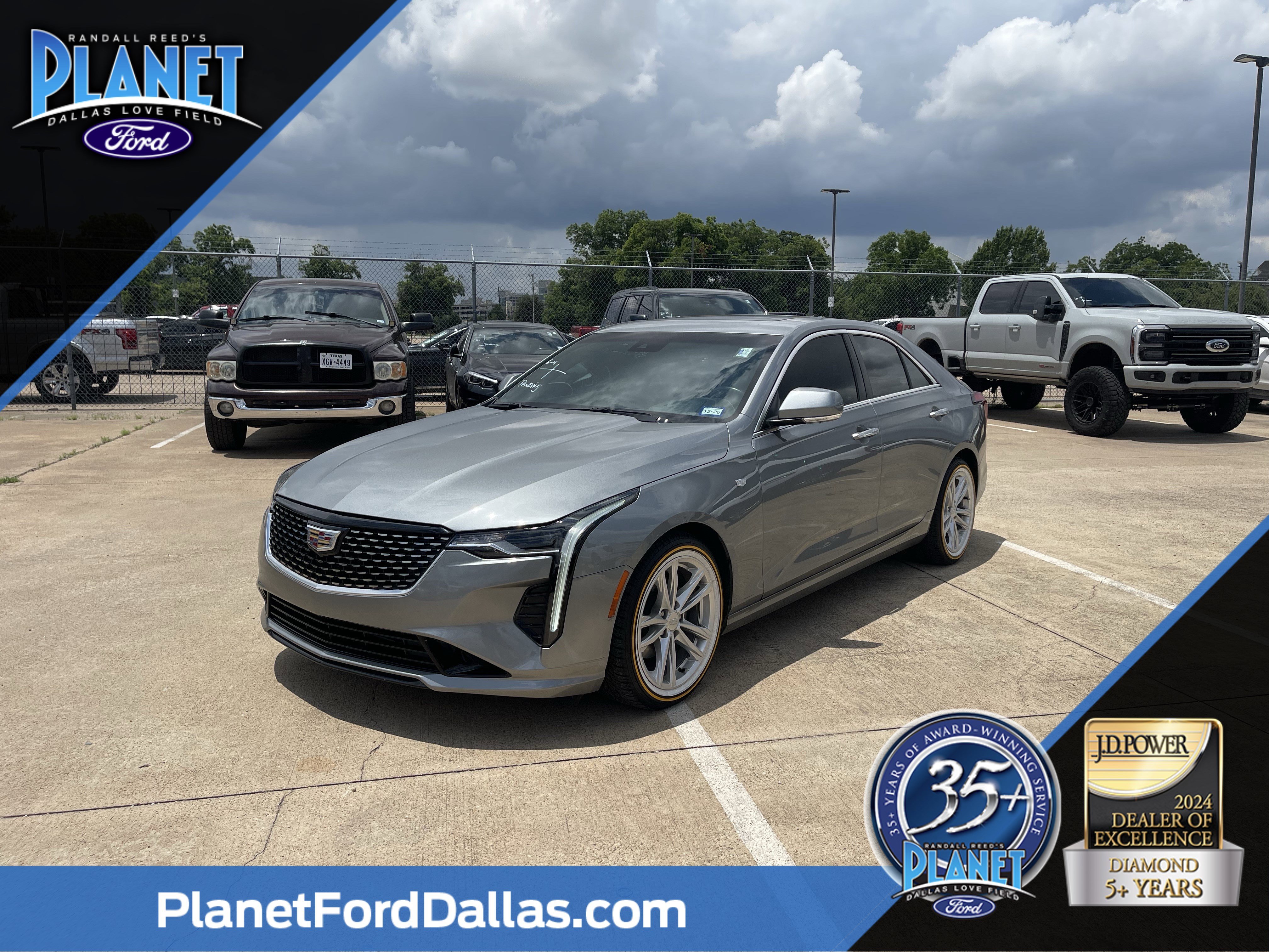 Used 2023 Silver Metallic Cadillac Luxury image 1