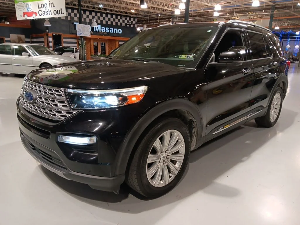 Used 2020 Black Metallic Ford Limited image 1