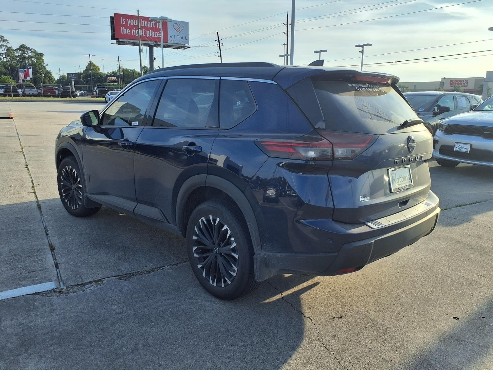 Certified Used 2026 Deep Ocean Blue Pearl Nissan Dark Armor image 2