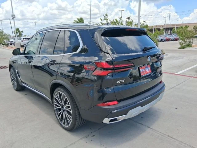 New 2026 Black Sapphire Metallic BMW sDrive40i image 4