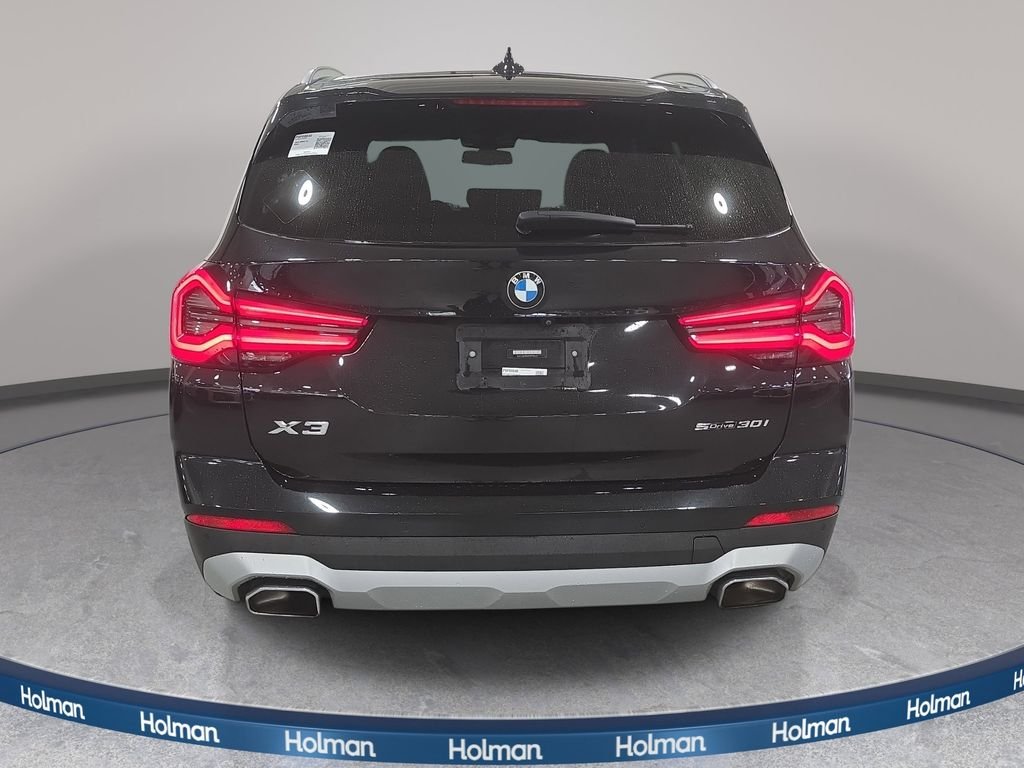 Used 2023 Black Sapphire Metallic BMW sDrive30i image 7