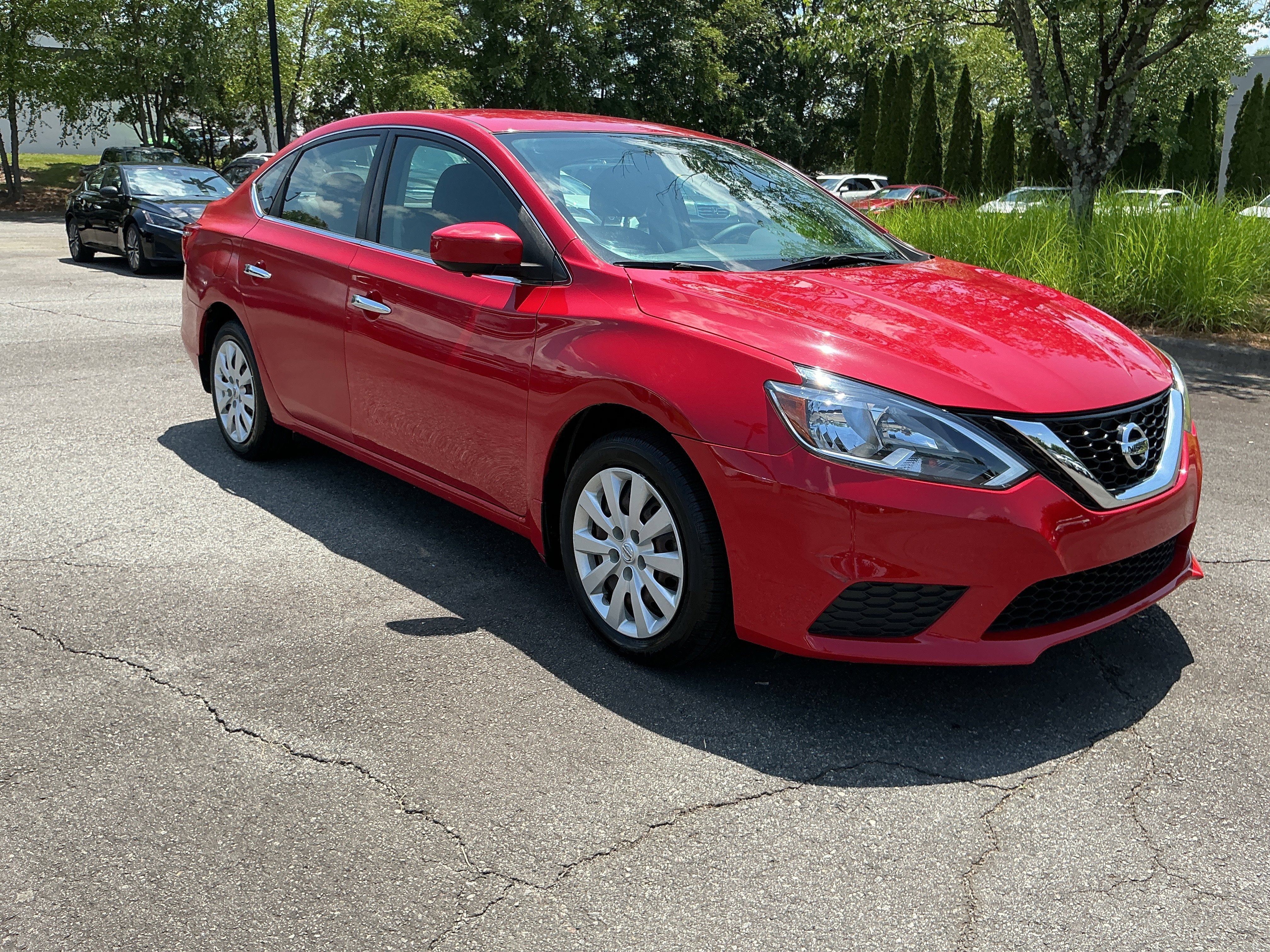 Used 2017 Red Alert Nissan SV image 5