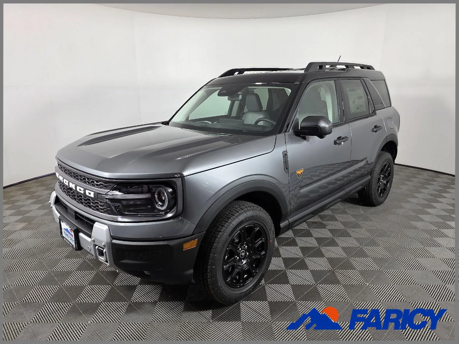 Used 2026 Carbonized Gray Metallic Ford Badlands image 1