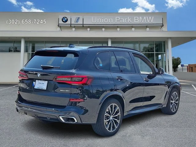 Used 2021 Black Sapphire Metallic BMW xDrive40i image 4
