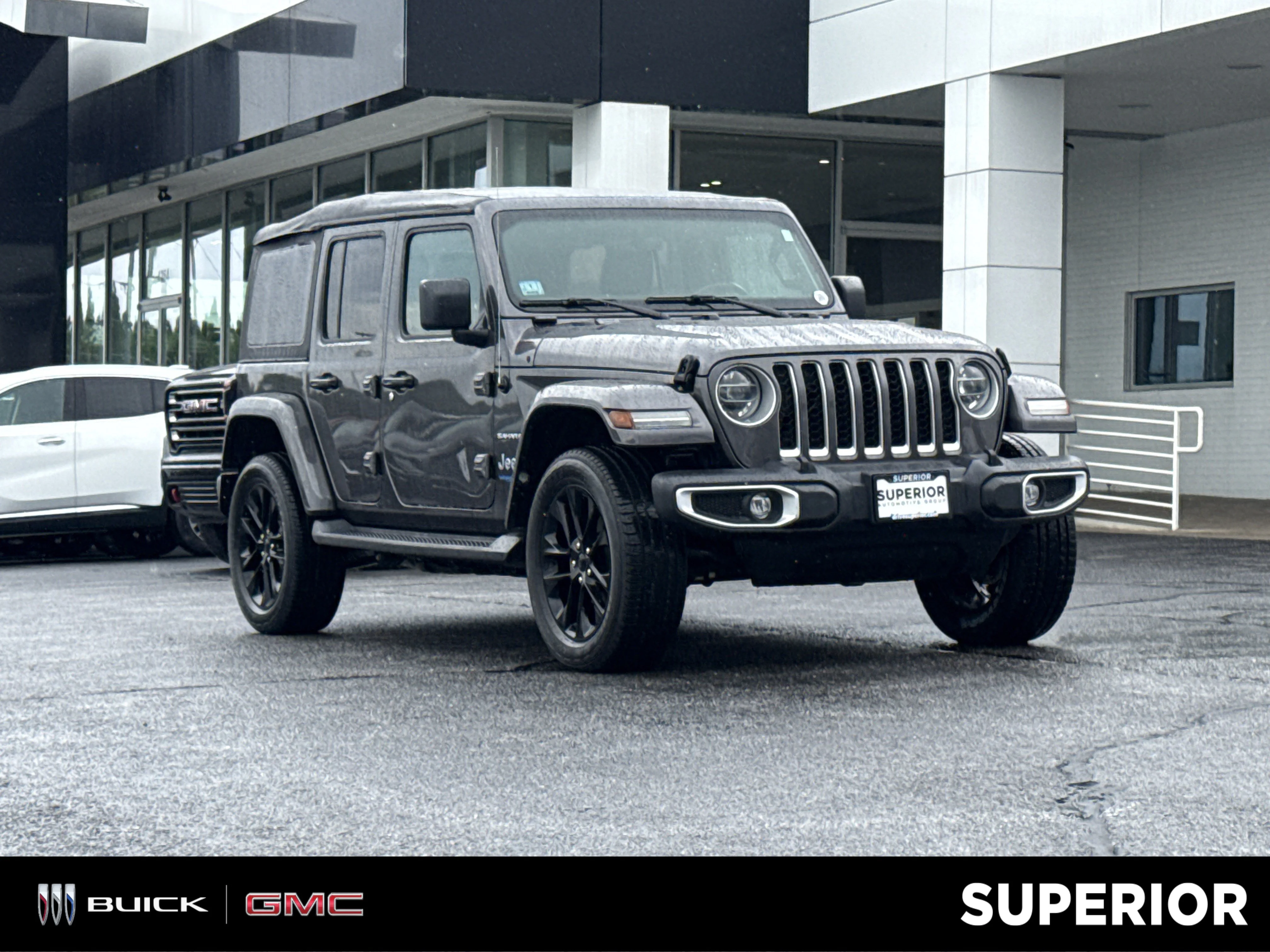 Used 2021 Granite Crystal Metallic Clearcoat Jeep Unlimited Sahara 4WD image 1