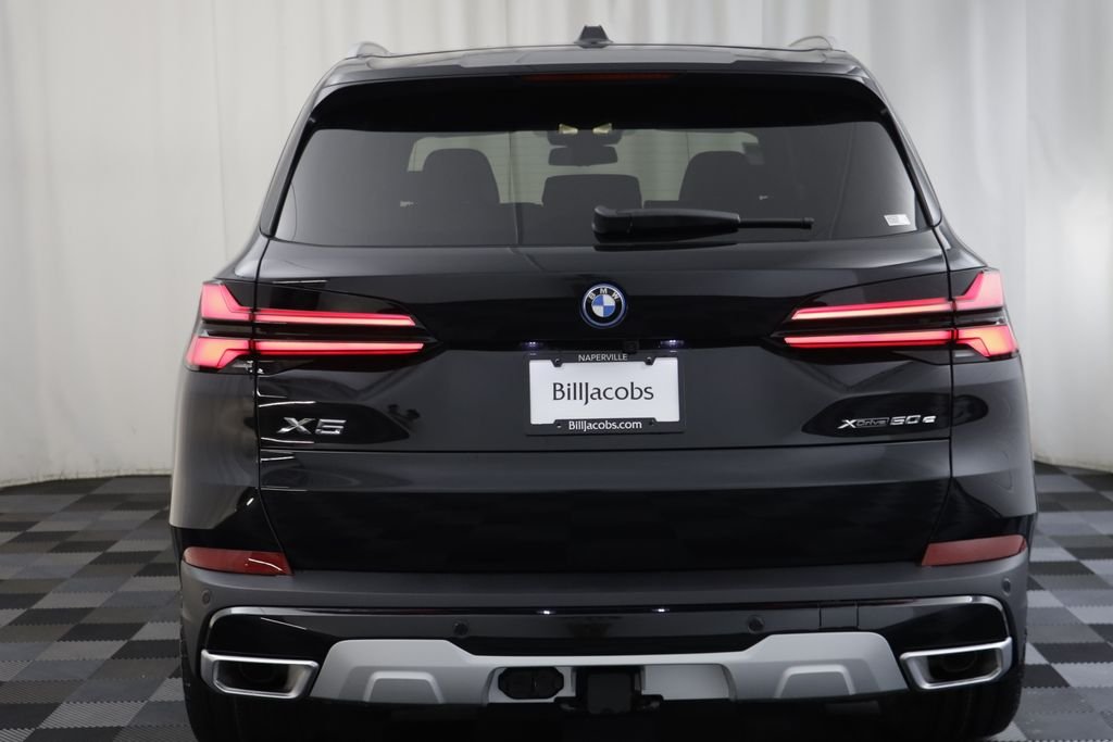 New 2026 Black Sapphire Metallic BMW xDrive50e image 17