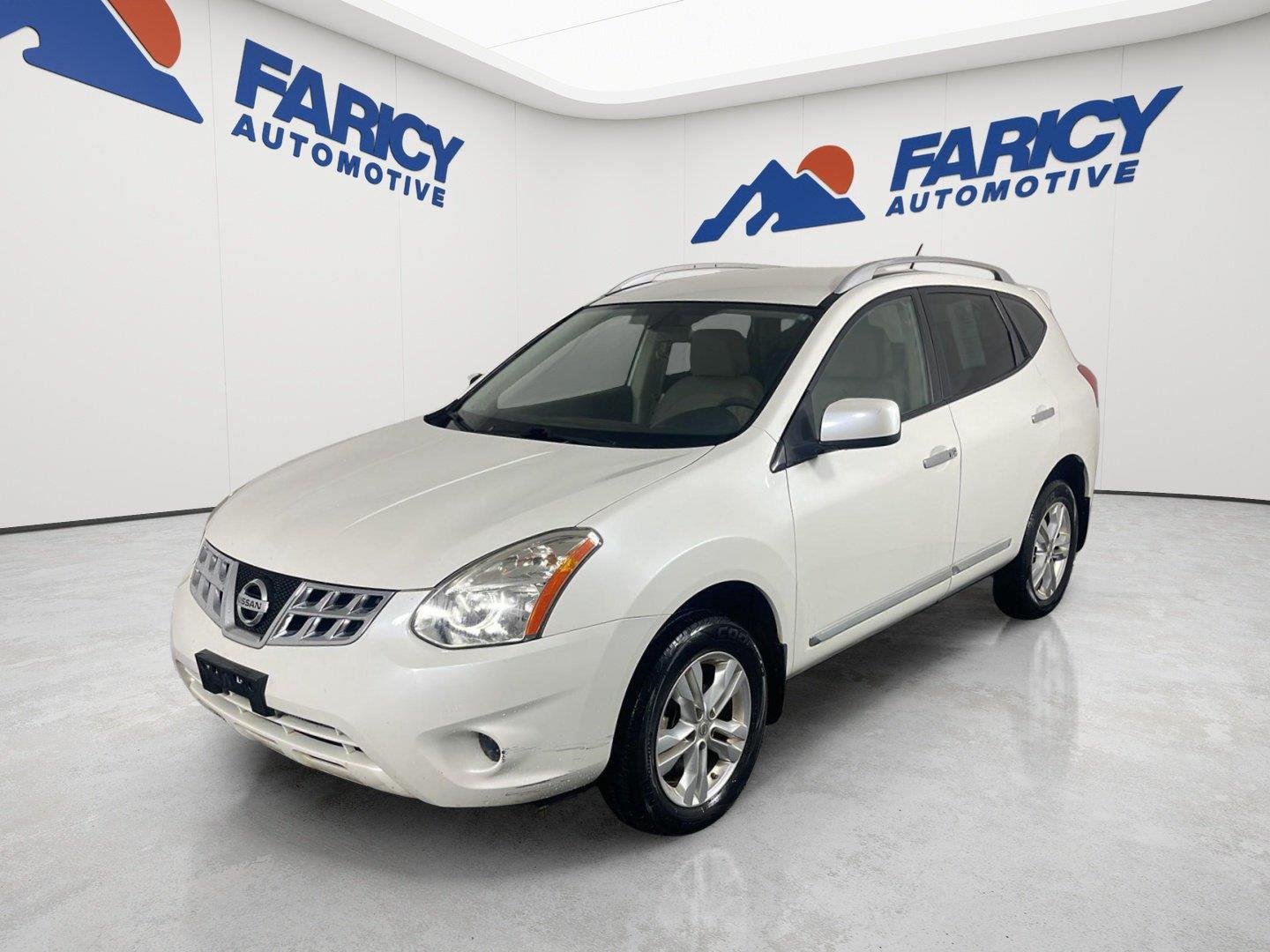 Used 2013 Pearl White Nissan SV image 1