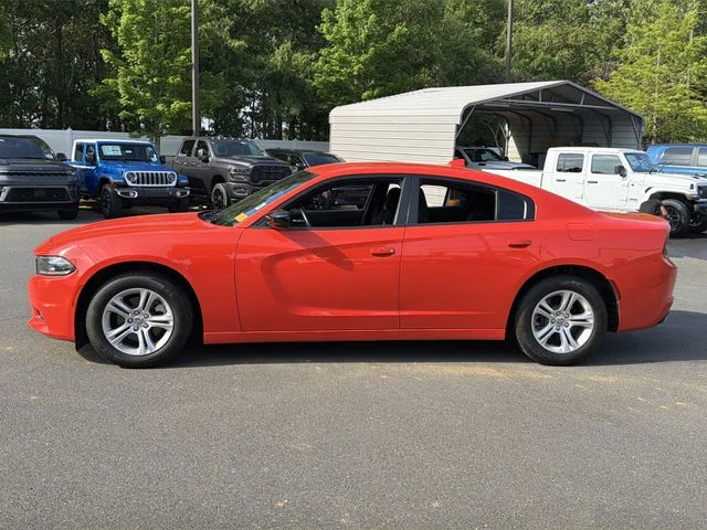 Used 2023 Orange Dodge SXT image 2
