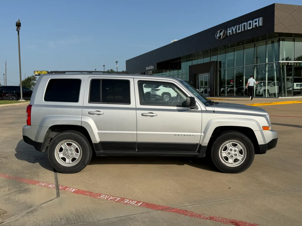 Used 2011 Bright Silver Metallic Clearcoat Jeep Sport image 7