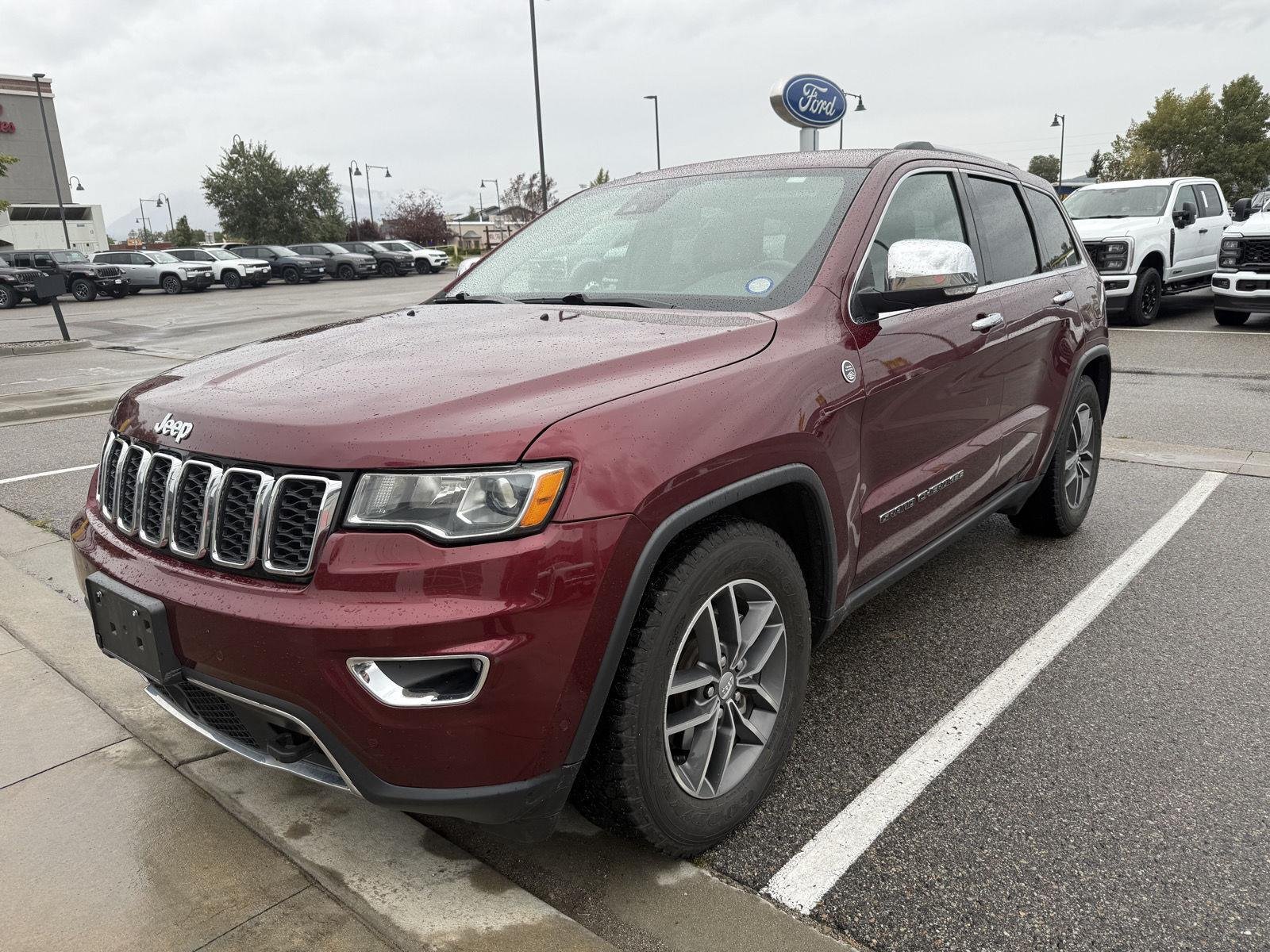 Used 2018 Velvet Red Pearlcoat Jeep Limited image 1